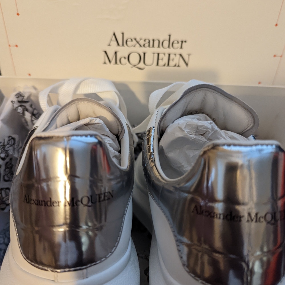 Men's Silver Alexander McQueen sneakers.  Excellent condition only worn twice.